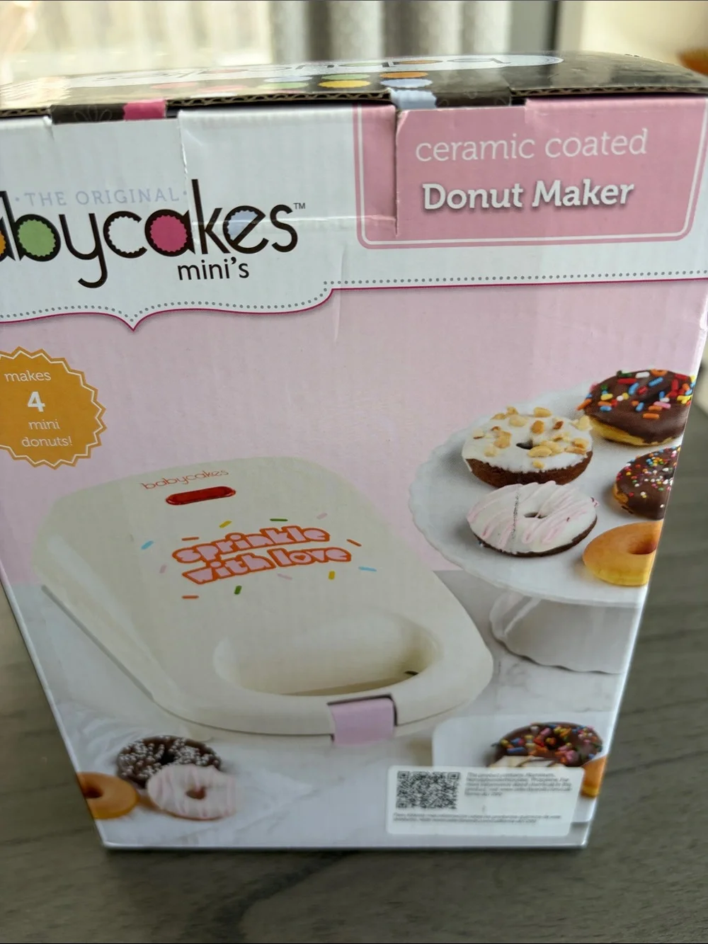 Babycakes Ceramic Coated Mini Donut Maker in Cream and Pink